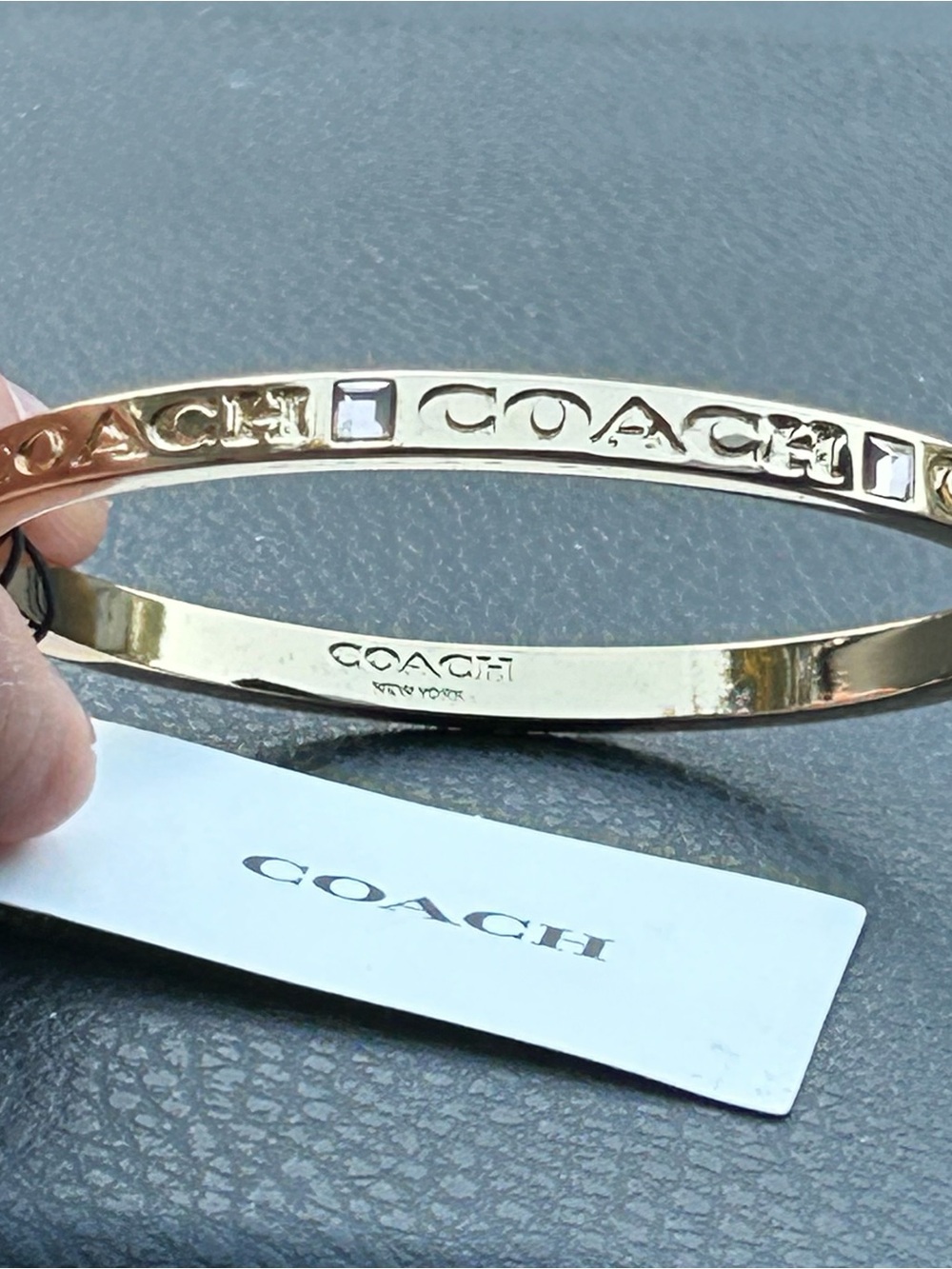 Coach Gold-Tone Logo Bangle Bracelet